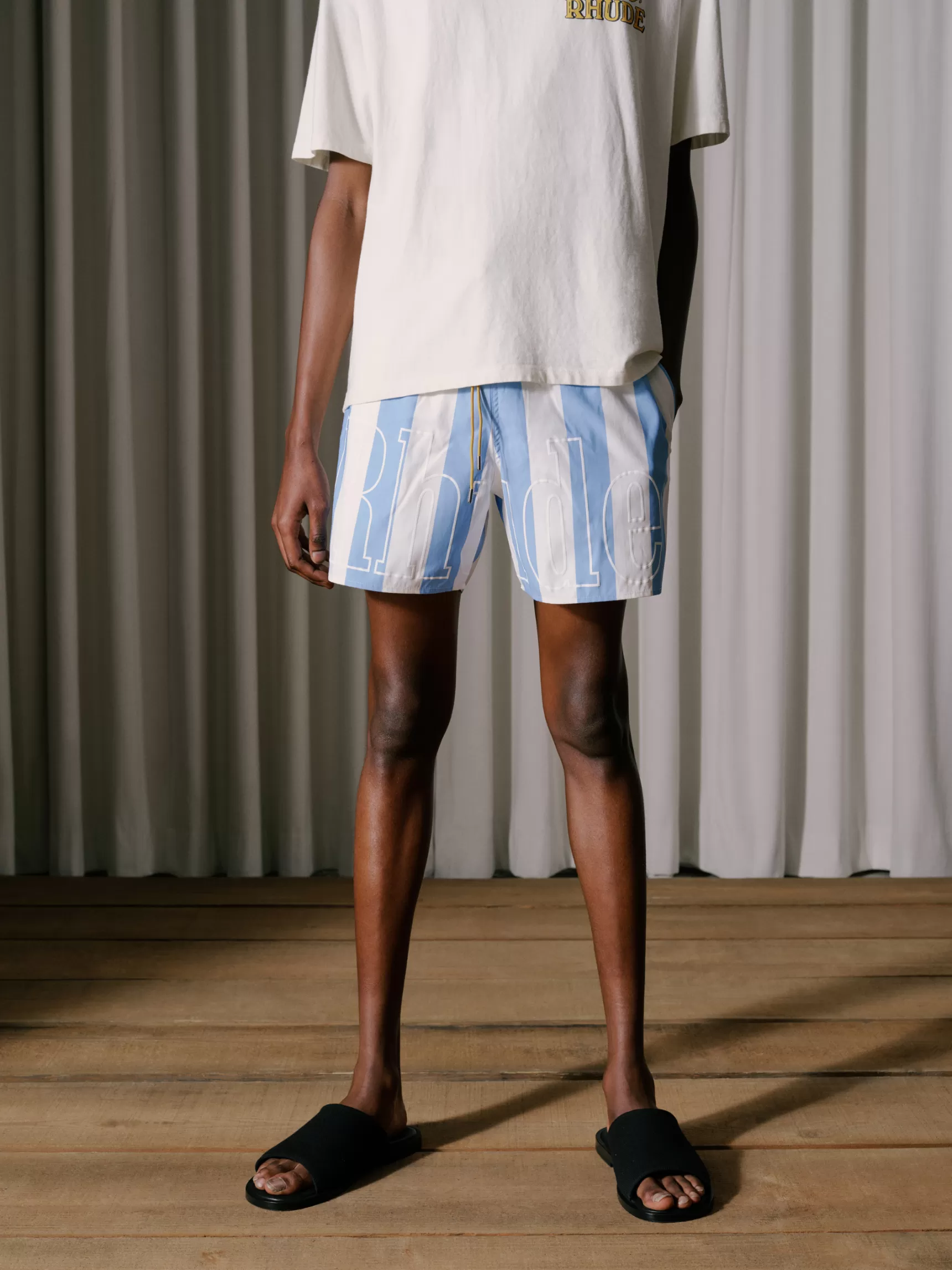 R H U D E Shorts>RHUDE LOGO STRIPED TRUNKS